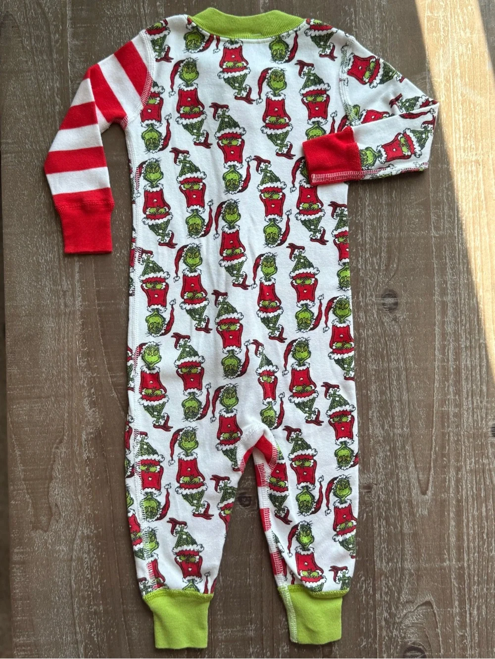 Hanna Andersson Red & White Stripe Grinch Print Footie with Green Trim